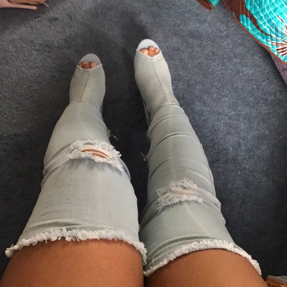 Distressed knee high boots